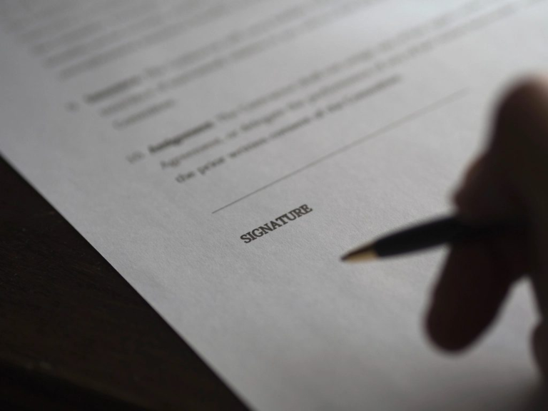 A person signing a legal contract